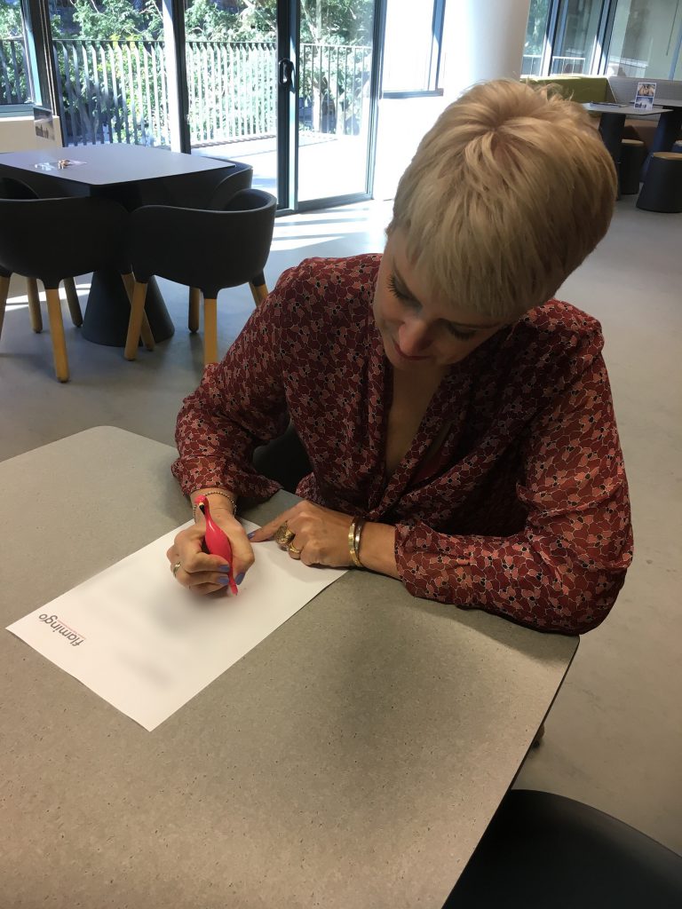 Signing some of the final paperwork, with a pen I'd kept on hand specially for the occasion